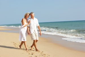 Senior Couple Enjoying Beach Holiday